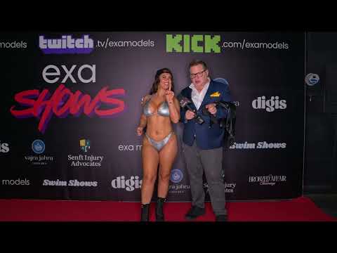 Model Amber Fields on the red carpet at Exa Shows Art Basel Miami wearing Berry Beachy